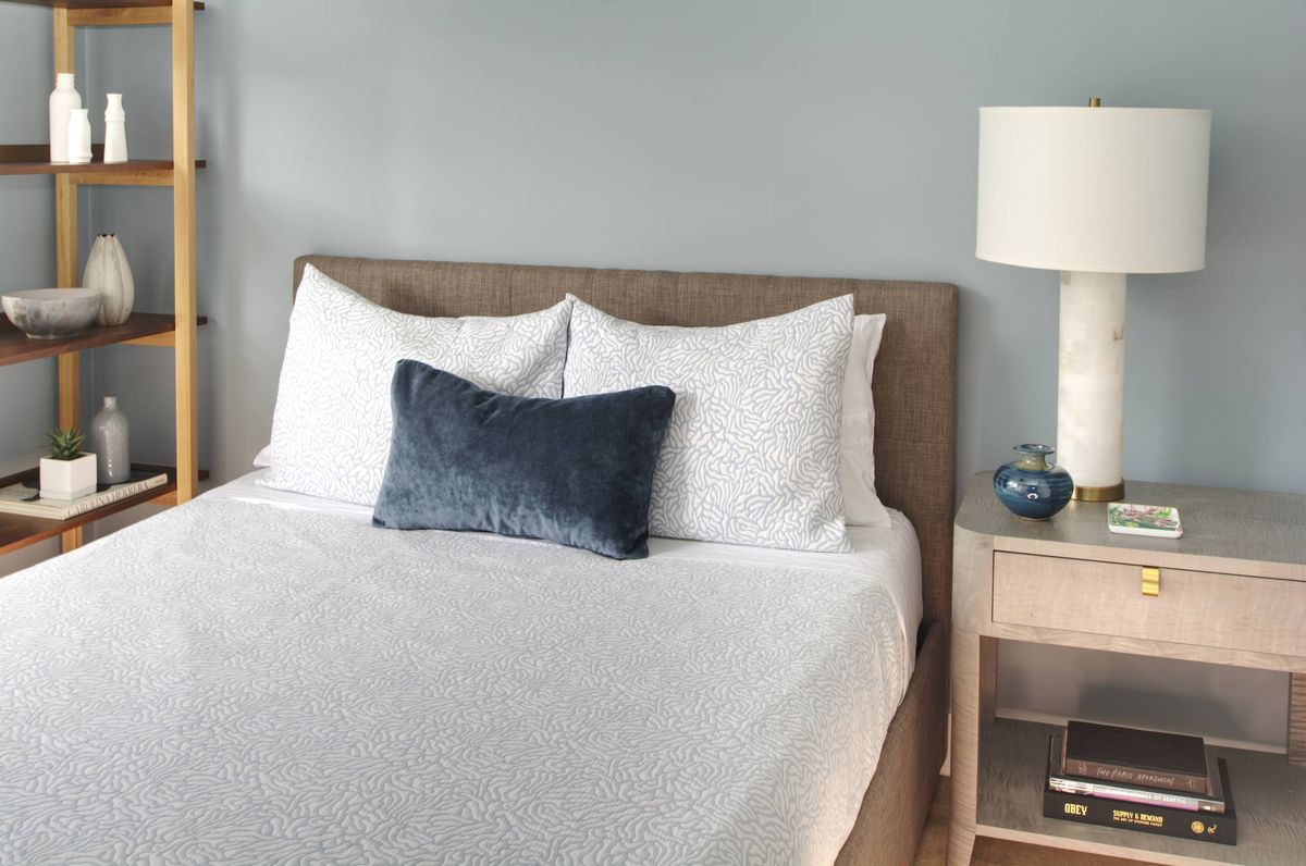 Bedroom with modern furnishings and warm tones, Belltown Residence — Belltown, Seattle