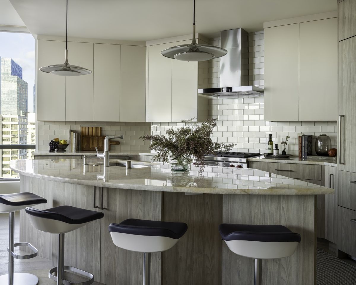 Living space with layered textures and warm tones, Downtown High Rise — Downtown, Seattle